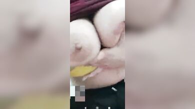 Girlfriend lifting T-shirt and showing fluffy huge boobs