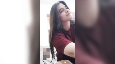 Girlfriend lifting T-shirt and showing fluffy huge boobs